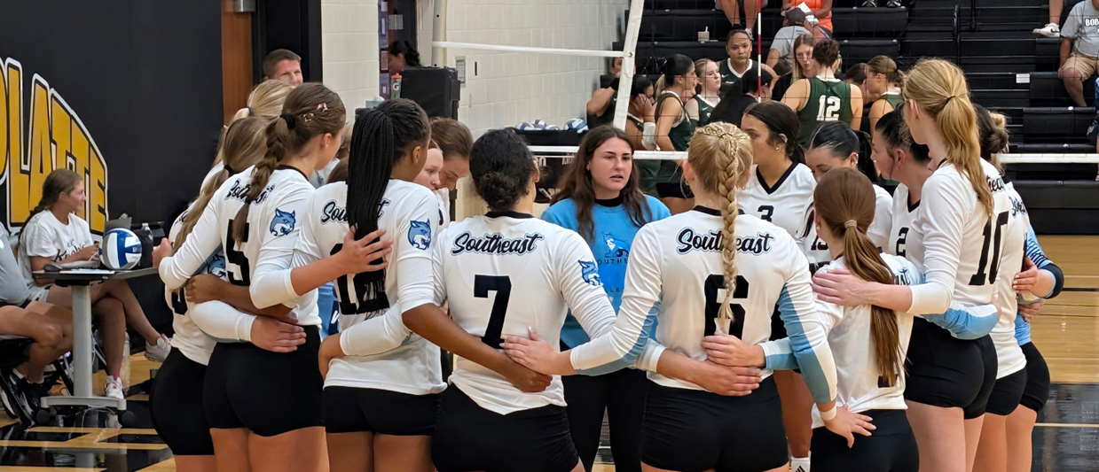 SCC Volleyball huddles during a game