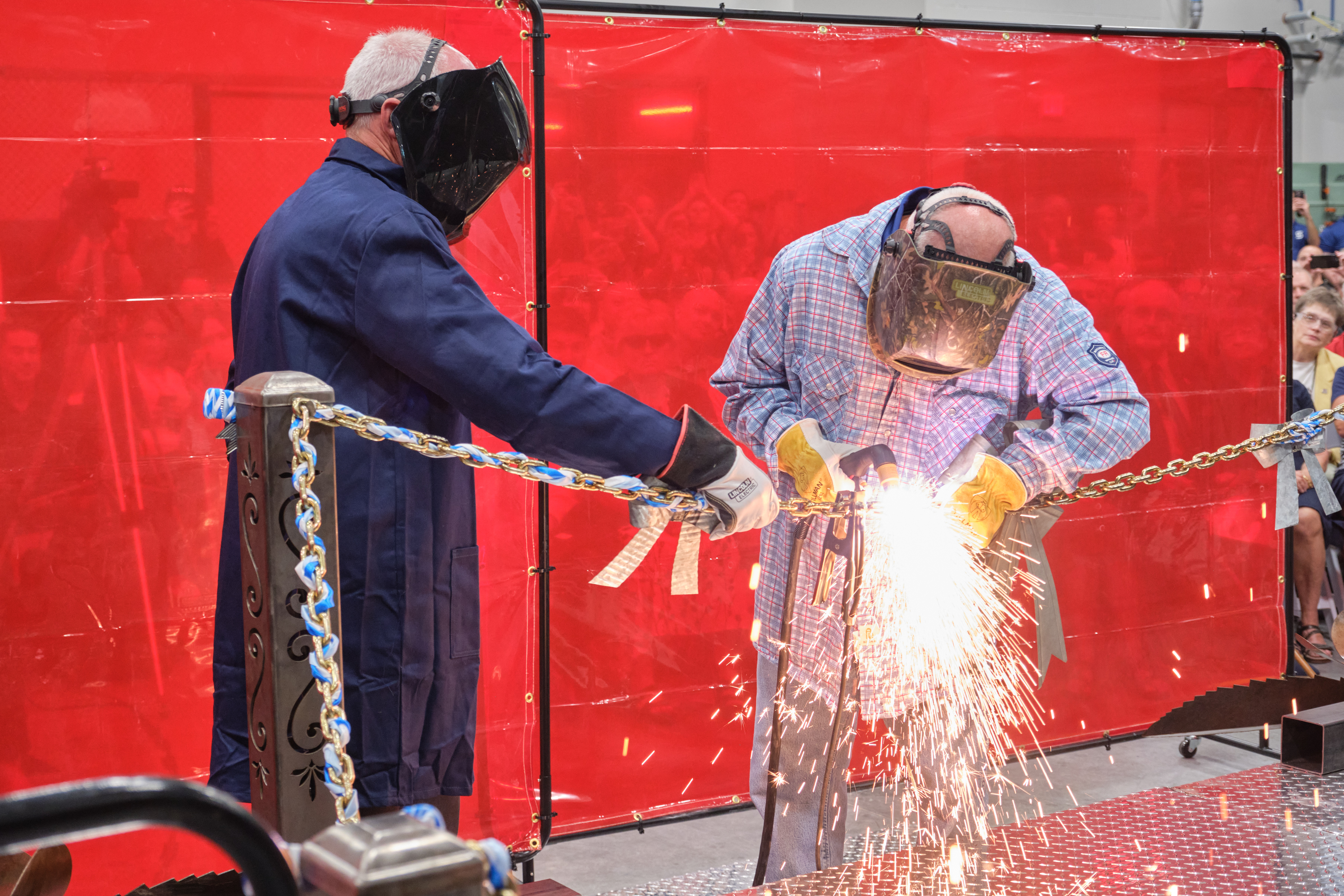 President Illich and Mark Hawkins, Welding Program Chair and Instructor, “cut” the ribbon in true welding style to officially open the new Welding Technology Center. 