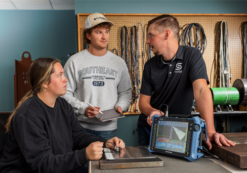 Instructor Zachary Kisby (right) and Nondestructive Testing students. 